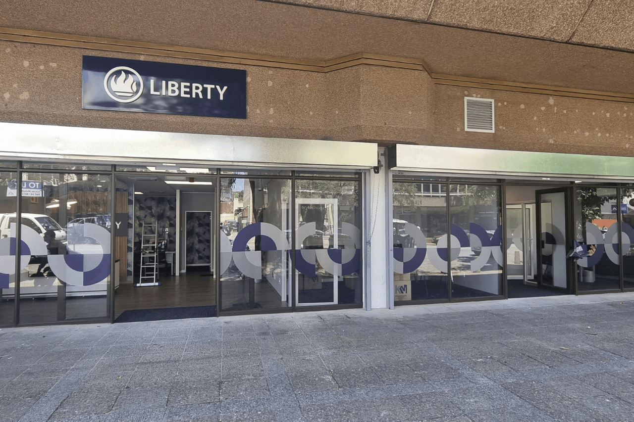 Liberty Life help center, featuring a shop front with accessible entrance and signage.