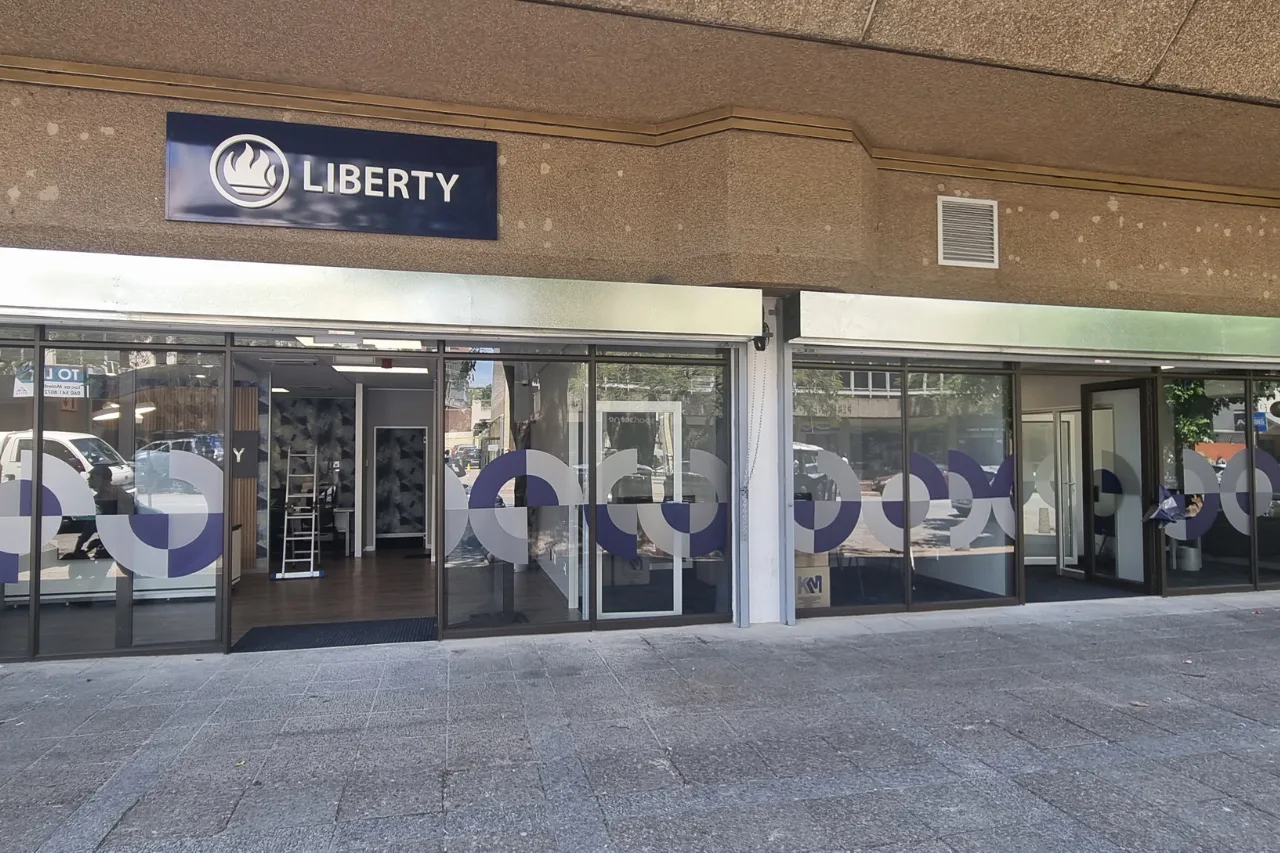 Liberty Life help center, featuring a shop front with accessible entrance and signage.